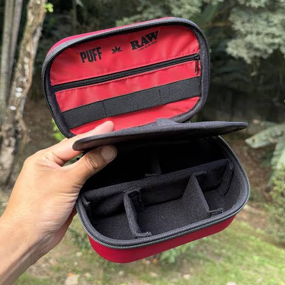 RAW Puff Life Pro Case, held open to show adjustable dividers inside