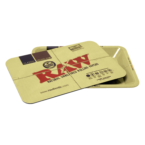 RAW Classic Magnetic Tray Cover (Large), lying offset on the tray, dark underside edge showing